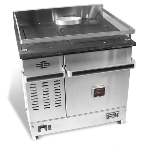 Dickinson Pacific diesel galley cooker on a white background. A stainless steel marine range featuring a large oven, a heavy-duty cooktop with sea rails, and an integrated diesel burner.