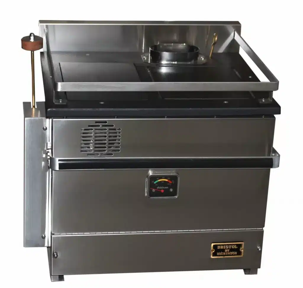 Dickinson Bristol diesel marine cooker and oven isolated on a white background. A compact, stainless steel galley stove featuring one burner and a full-size oven for sail and motorboats.