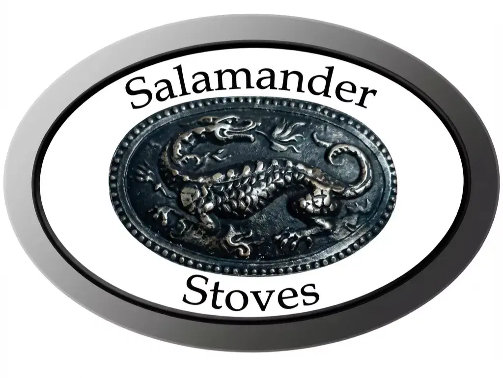 A close-up of the Salamander Stoves logo cast into the iron body of a Hobbit stove, signifying British engineering and Devon-based manufacturing.