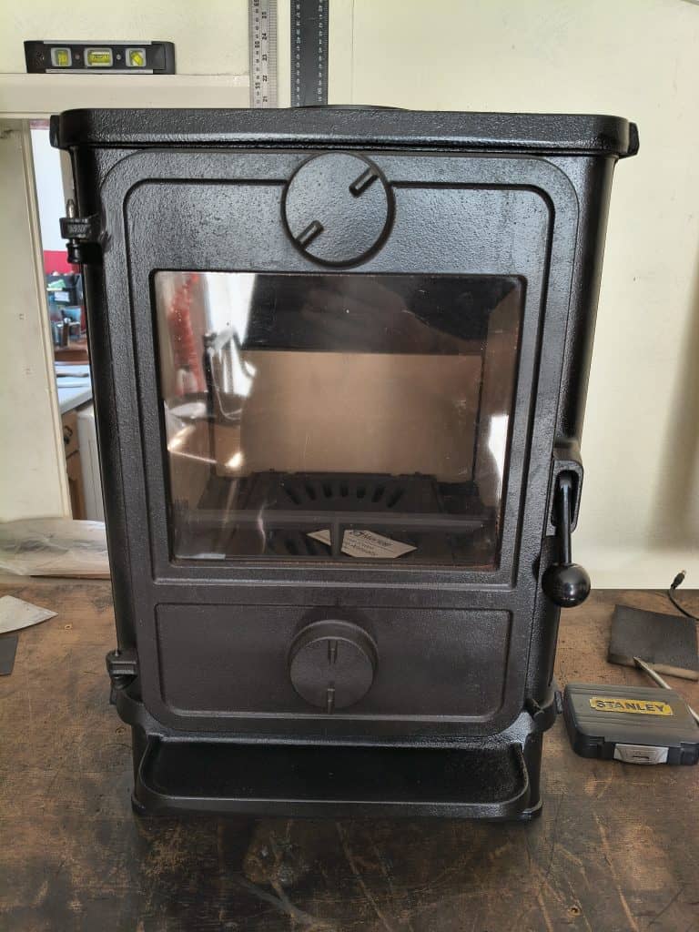 Front view of reconditioned Morso 1412 cast iron boat stove