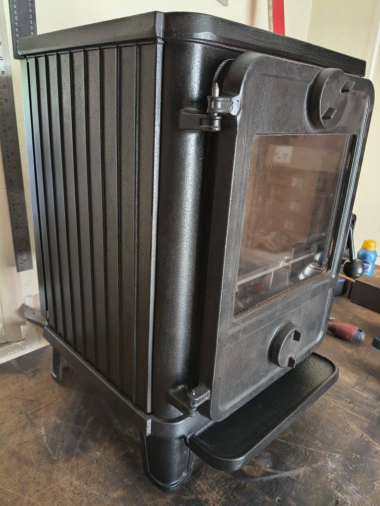 Side view of Morso 1412 boat stove with ribbed side panels
